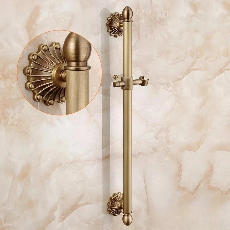 Antique brass bathtub shower set featuring an antique brass-finished sliding shower rod with ornate fan-shaped end caps