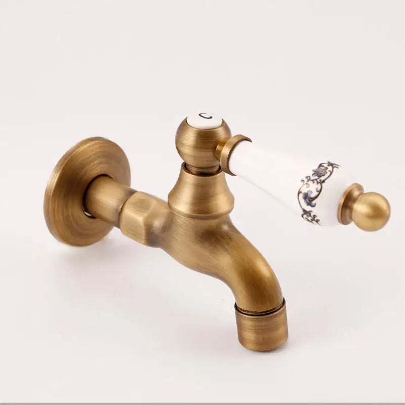 Antique brass bibcock faucet with floral ceramic handle in brass antique finish for garden tap by decorbites brass antique