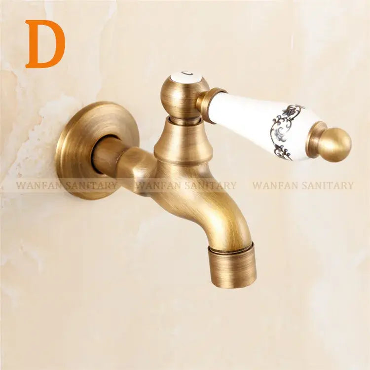 Antique brass bibcock faucet with brass antique finish and white ceramic handle featuring black floral decorbites brass antique design