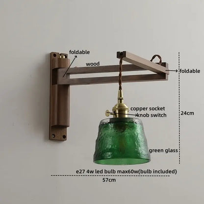 Antique brass ceramic walnut wall sconce with dark wood foldable arm and green textured glass scalloped shade decorbites ceramic walnut wall