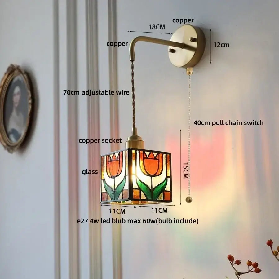 Copper-finished wall lamp with decorbites clear flower stained glass shade featuring orange and green tulip design