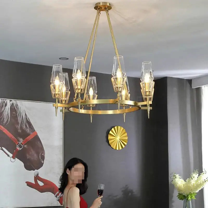 Gold-toned antique brass crystal glass wall light with clear shades and modern geometric design for bedroom and bath decorbites dimmable crystal