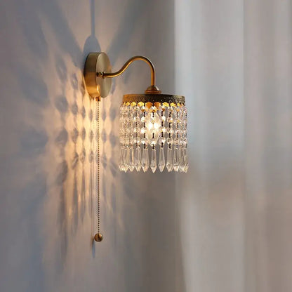 Antique brass crystal led wall sconce with clear crystal teardrop pendants for elegant bedroom decorbites crystal led lighting