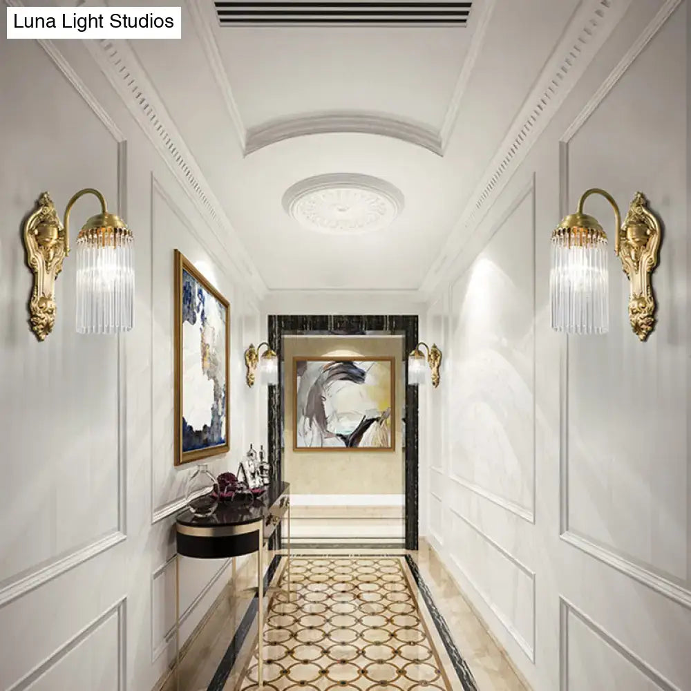 Antique brass crystal rod wall sconce with gold-toned ornate fixtures and cascading crystal prisms for corridor lighting