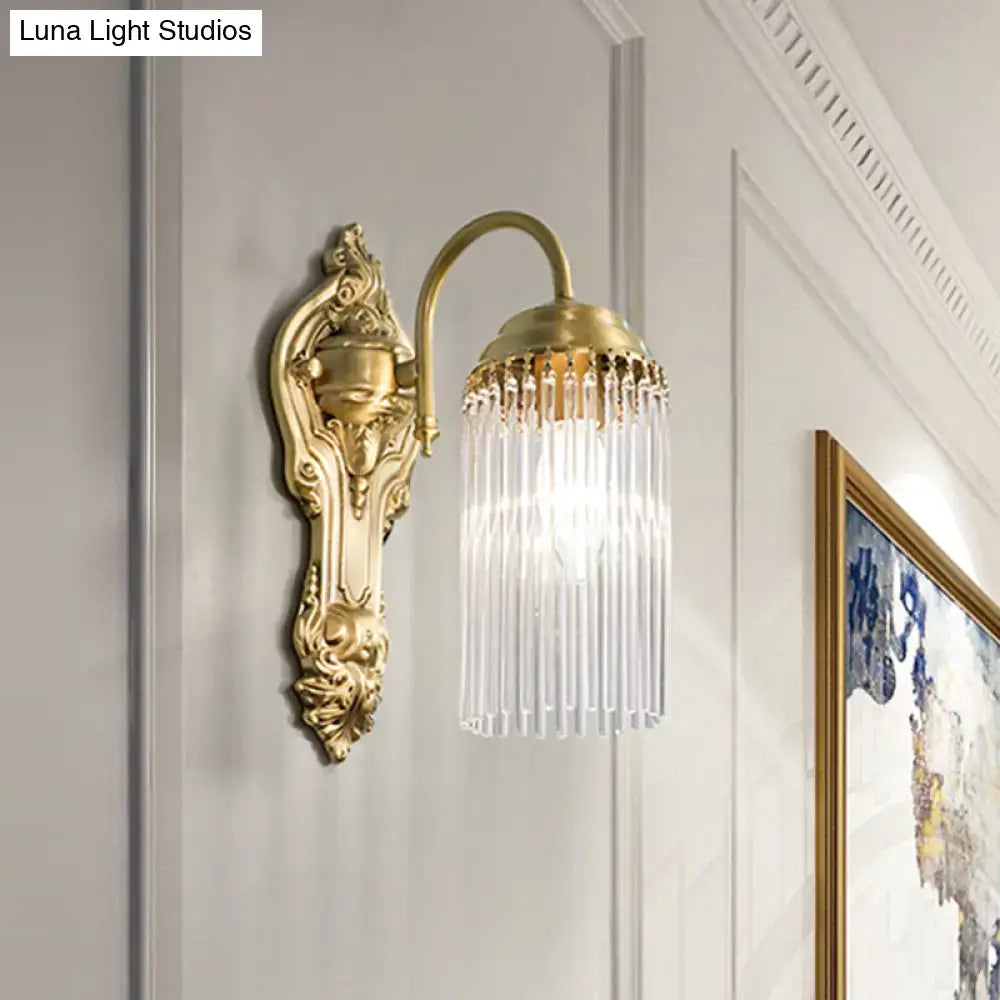 Antique brass crystal rod wall sconce with gold-toned ornate design and crystal glass prisms for corridor lighting