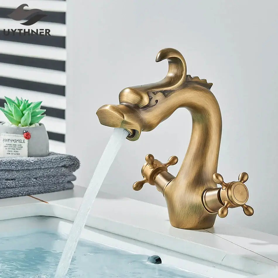 Antique brass decorbites dragon style bathroom basin faucet mixer tap with ornate dragon detailing and dual cross handles