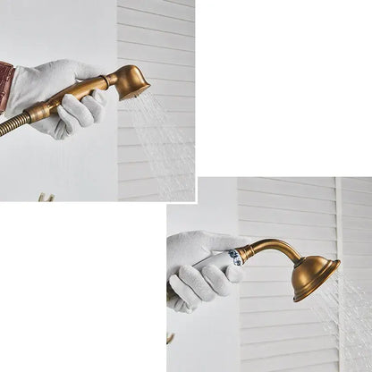 Antique brass dual handle floor mount bath set with handheld showerhead featuring blue floral decorbites brass floor detailing