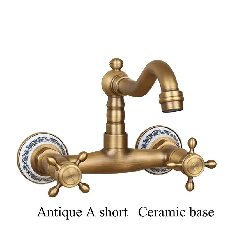 Antique brass dual handle kitchen faucet with porcelain plate and ornate cross handles for hot water control
