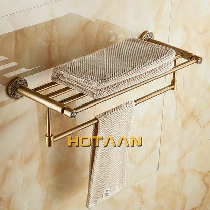 Antique brass floral double towel rack with ornate circular end caps for bath towel storage by decorbites brass bath