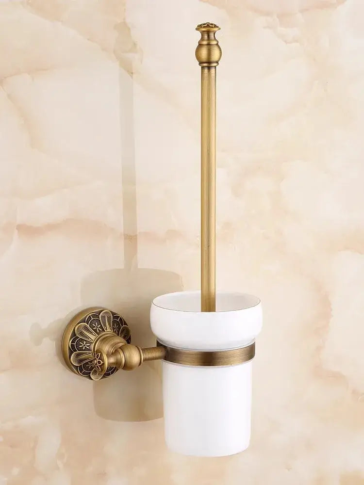 Antique brass floral bathroom hardware set featuring a brass bathroom decorbites toilet brush holder with ceramic cup