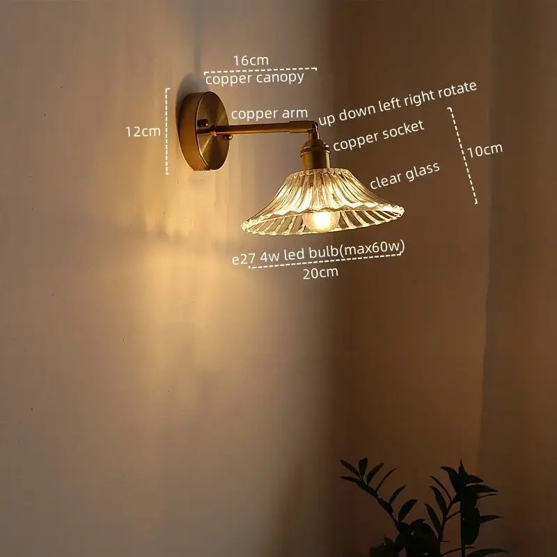 Copper-finished antique brass flower glass sconce led wall lamp with clear fluted shade and adjustable arm for bedroom