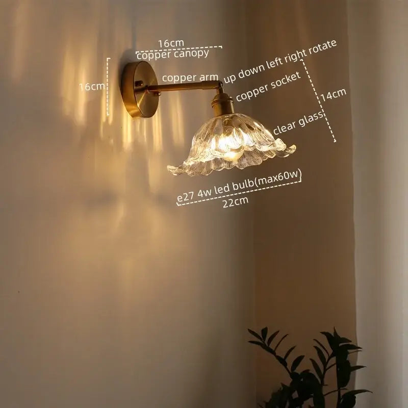 Antique brass flower glass sconce led wall lamp with a brass finished copper canopy and clear blooming glass shade