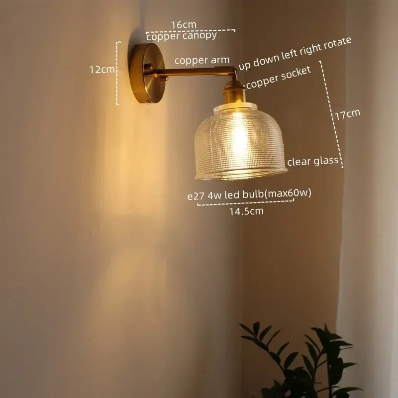 Antique brass flower wall lamp featuring a warm copper glass sconce led with clear textured shade for bedroom use