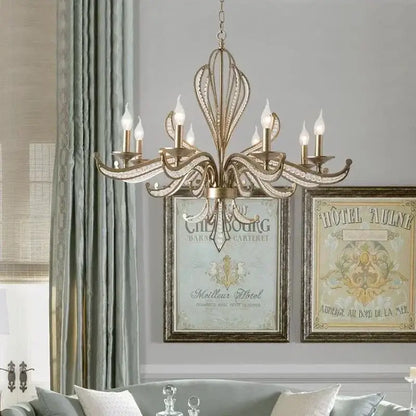 Antique brass french candle pendant lighting with intricate leaf arms and crystal accents by decorbites french candle
