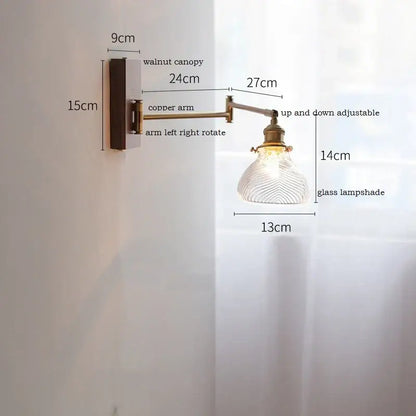 Adjustable copper arm wall light with walnut canopy and decorbites clear glass lampshade for bedroom decor