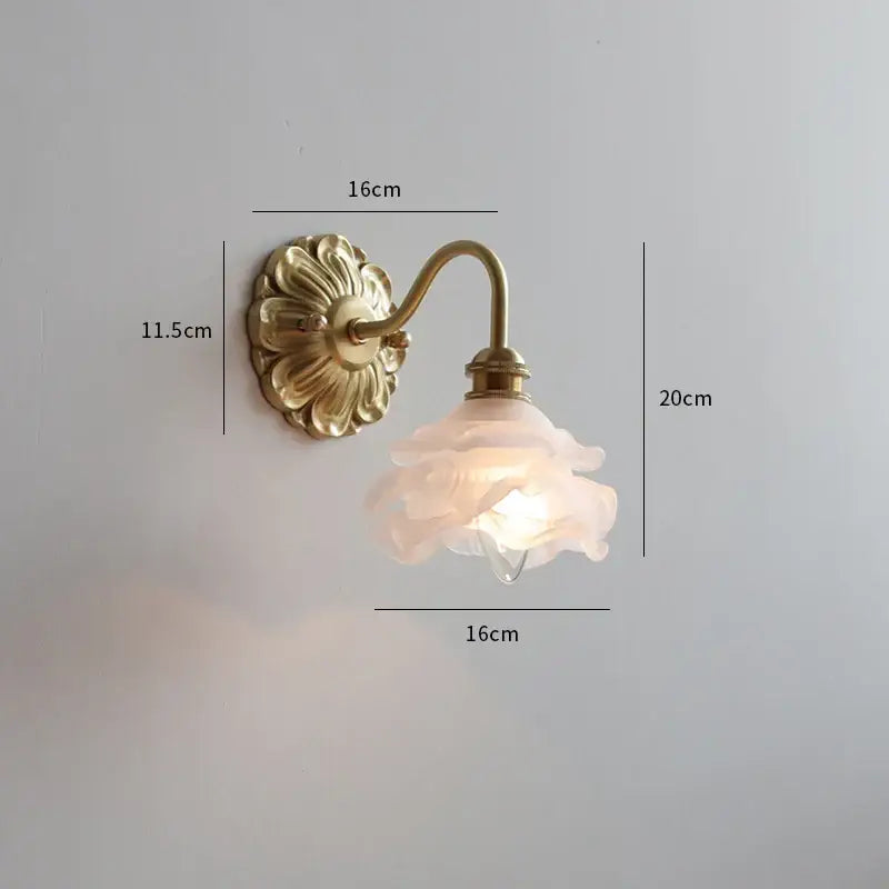 Antique brass wall light with delicate pink translucent glass shade shaped like an open rose for ceramic led wall decorbites