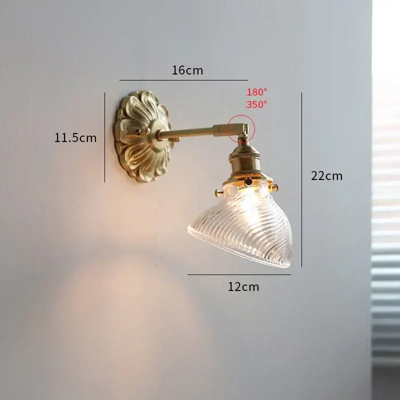 Antique brass wall lights with ribbed glass shade designed as bedroom sconce by decorbites ceramic ball led collection