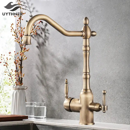 Antique brass vintage kitchen water filter faucet with dual spout and ornate turned spout design with dual handles