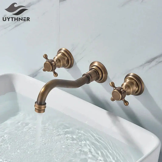 Antique brass wall mounted black basin faucet with two cross-handle knobs and curved spout for decorbites black basin faucet