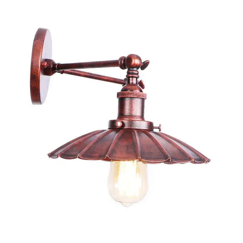 Antique bronze adjustable rustic led wall lamp with fluted petal-shaped shade and exposed edison bulb for bedroom decorbites