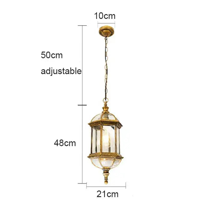 Antique bronze black outdoor hanging pendant light with brass finish clear glass panels and ornate detailing decorbites black outdoor