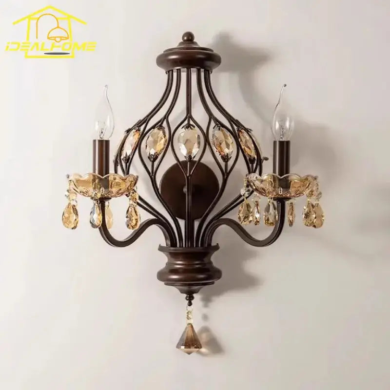 Antique bronze crystal candle wall lamp with intricate wrought iron design and amber crystal accents for living room decorbites crystal candle