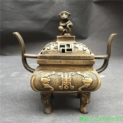 Antique bronze double dragon lion incense burner with intricate carvings and monkey figurine for living room decor