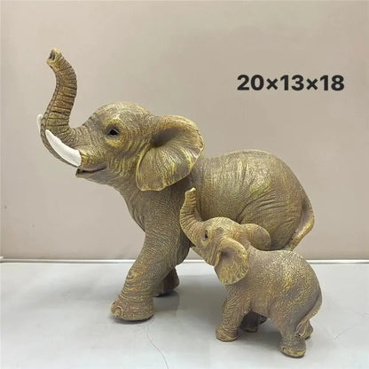 Antique bronze elephant family figurine set featuring golden-toned resin mother and calf with detailed skin and raised trunks