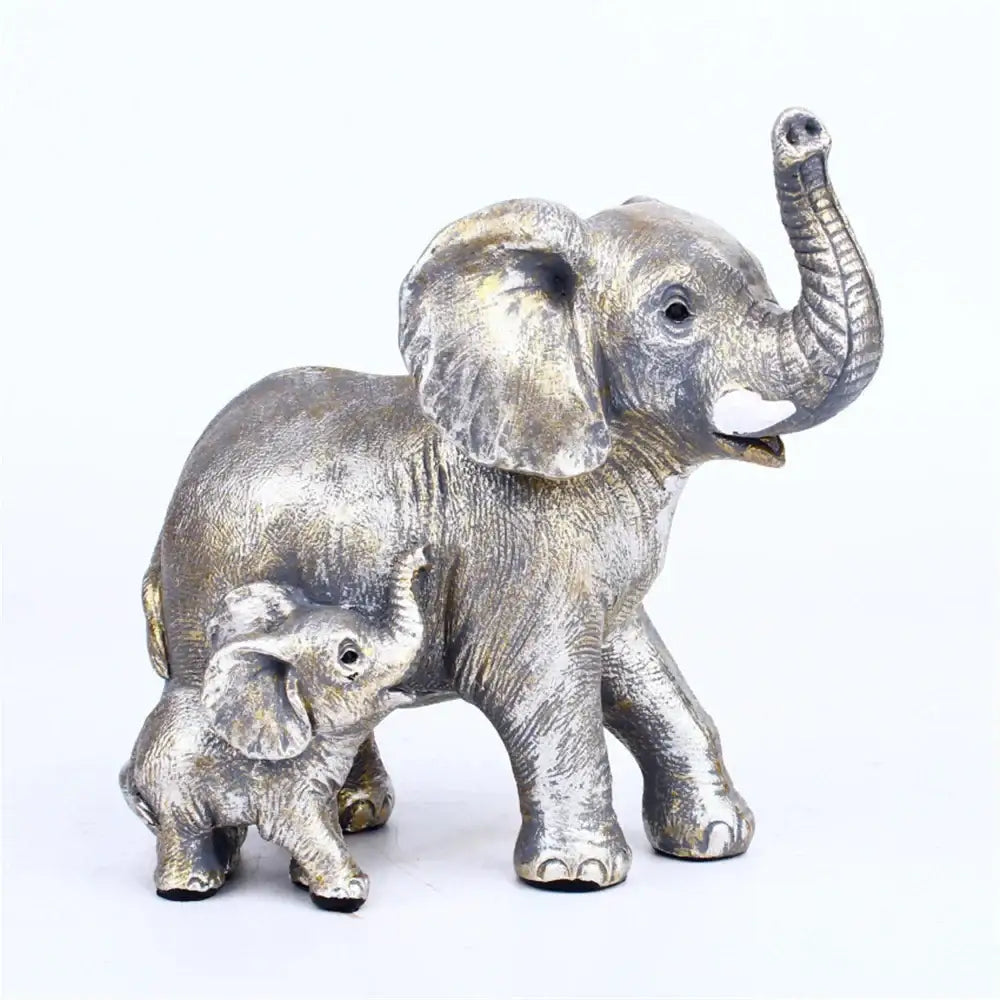 Silver-toned resin elephant family figurine with detailed textured skin and raised trunks for living room decor