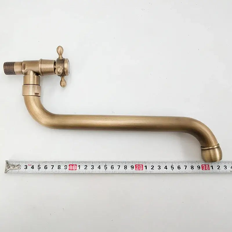 Antique bronze single cold wall mounted kitchen mop pool faucet with brass finish curved spout and cross-handle single hole design