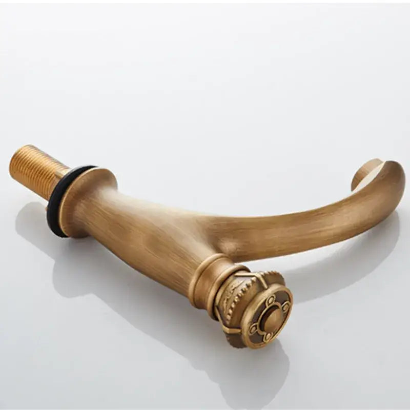 Antique ornate brushed bronze basin faucet with antique brass finish and decorative knob from decorbites brushed bronze collection