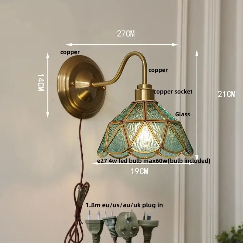 Antique teal glass and brass wall light fixture with geometric leaded design for bedroom sconce lighting