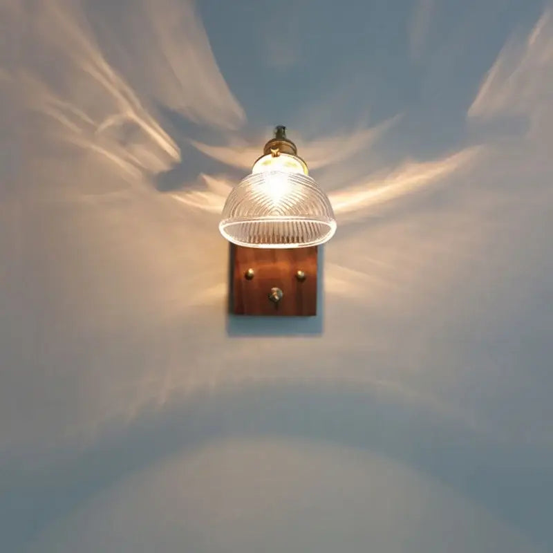 Antique walnut and brass wall light with clear glass ribbed shade and wooden backplate decorbites clear glass stair sconce