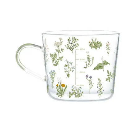 Clear glass 500ml glass mug with apricot and orange pattern and delicate botanical illustrations for breakfast use