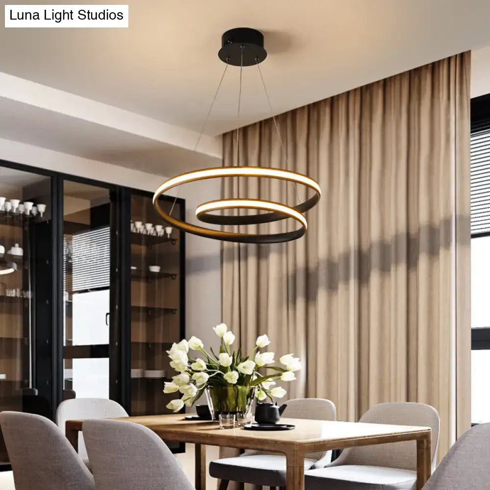 Modern black and gold double-ring led chandelier light fixture designed as art deco suspension lighting for dining room