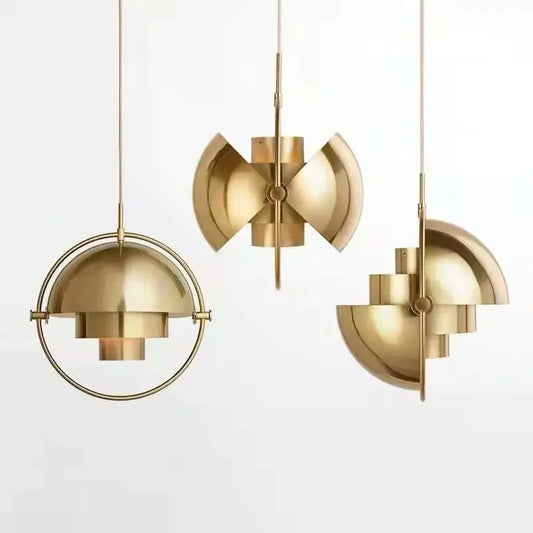Three elegant art deco brass pendant lights with flower-like bulb base designs for dining room illumination