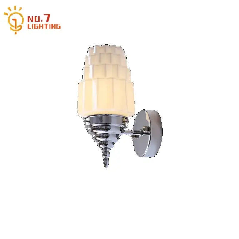 Art deco chrome wall lamp with cream glass led shade featuring geometric patterns for elegant bedroom decorbites cream glass