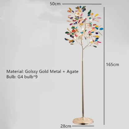 A tall slender art deco floor lamp with gold metal base and colorful agate leaves decorbites agate floor lamp
