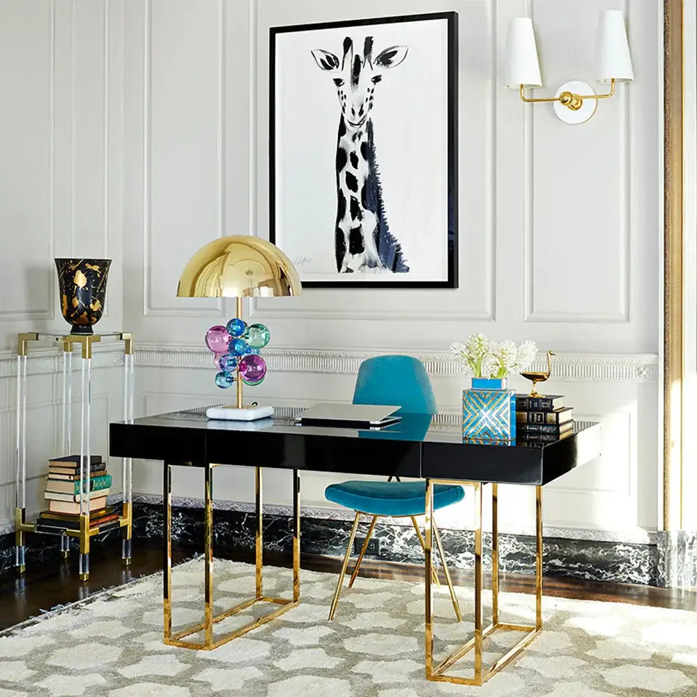 Black glossy desk with gold metal legs and art deco decorbites crystal bubble led desk lamp on marble base