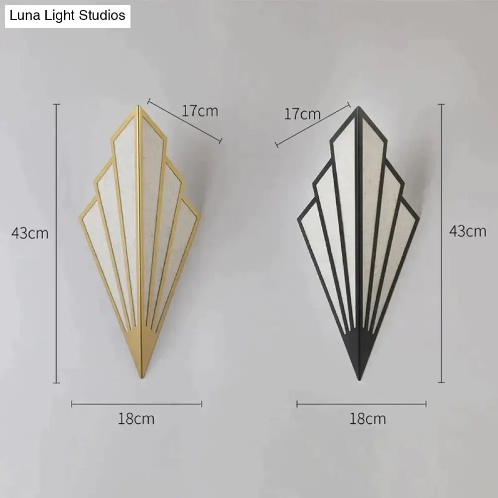 Art deco gold diamond shape modern wall light with black metal frame and frosted glass panels for bedroom use