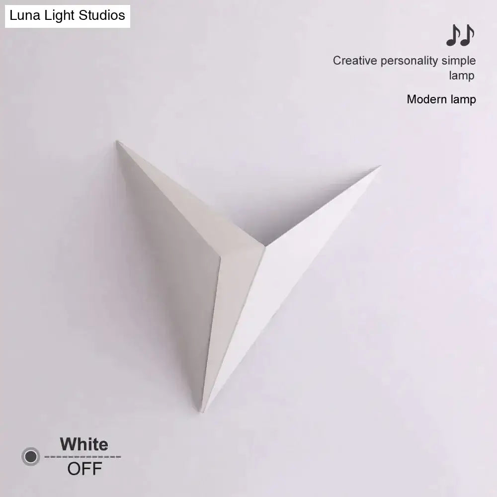 White geometric wall light with clean minimalist triangular design for bedroom in diamond shape modern style