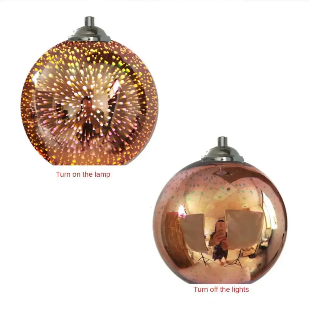 Art deco glass globe pendant light with rose gold finish and glowing golden speckles for dining room use