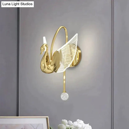 Art deco gold swan wall lamp with translucent mesh wing and crystal orb for bedroom bedside wall lighting