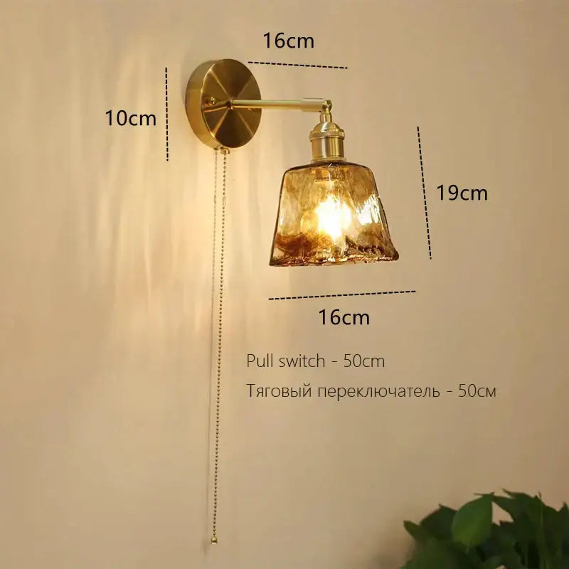 Art deco led wall lamp with brass finish and textured amber glass shade with pull chain switch by decorbites art deco
