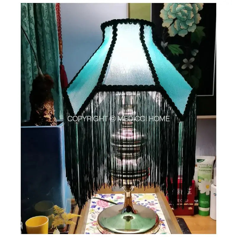 Art deco malachite green and teal velvet fringe lampshade with beaded trim on ornate metallic base decorbites art deco