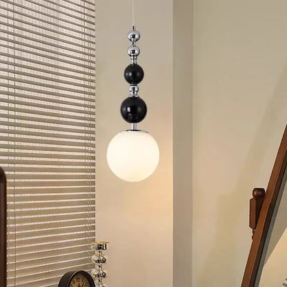 Art deco silver lava pendant light with black and chrome spherical design and frosted glass globe for living room with led bulb