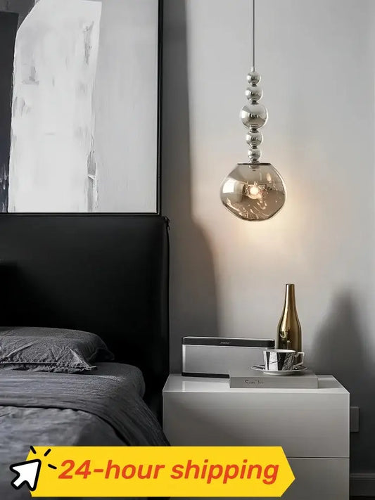 Art deco silver lava pendant light with a sleek spherical glass shade and polished metallic beads for living room with led bulb
