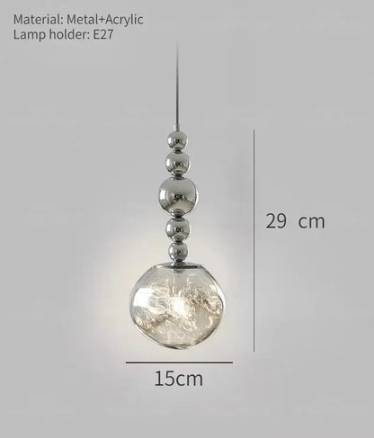 Art deco silver lava pendant light with chrome metal chain and textured acrylic globe for living room use under 20 square meters