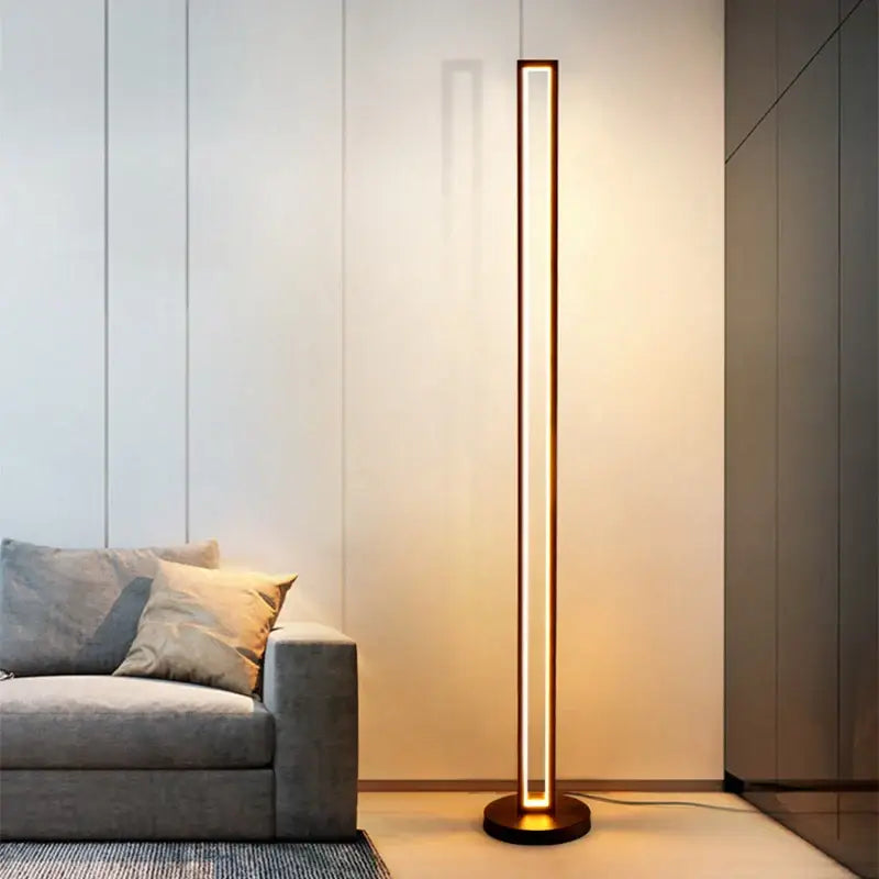 Modern minimalist art deco floor lamp with bronze frame and warm LED lighting for decorbites art deco ambient light