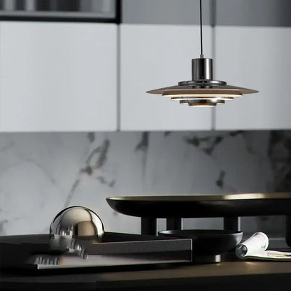 Modern brushed steel art deco pendant light with concentric circular white and silver aluminum shades for dining room